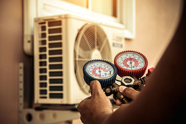 Professional Heat Pump Repair technician working in Elgin, IL